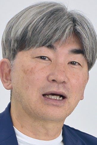 市原義文氏